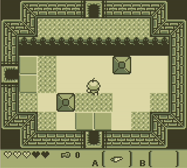A tiled dungeon room with spikes along the top wall and five hearts left